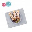 Fotografia, na której jest EZPZ Silikonowa miseczka z podkładką 2w1 Mini Bowl pastelowa szarość
