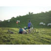 Fotografia, na której jest Przyczepka rowerowa dla dziecka - THULE Chariot Sport 2 - zielona/niebieska