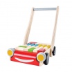 Fotografia, na której jest Drewniany wózek do pchania z klockami, Plan Toys®